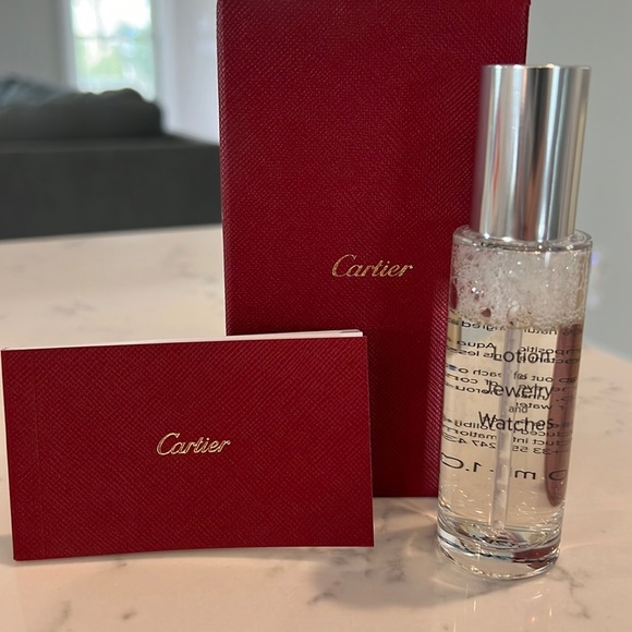 Cartier Other - Small Cartier box with lotion for jewelry  and watches.brush and cloth included